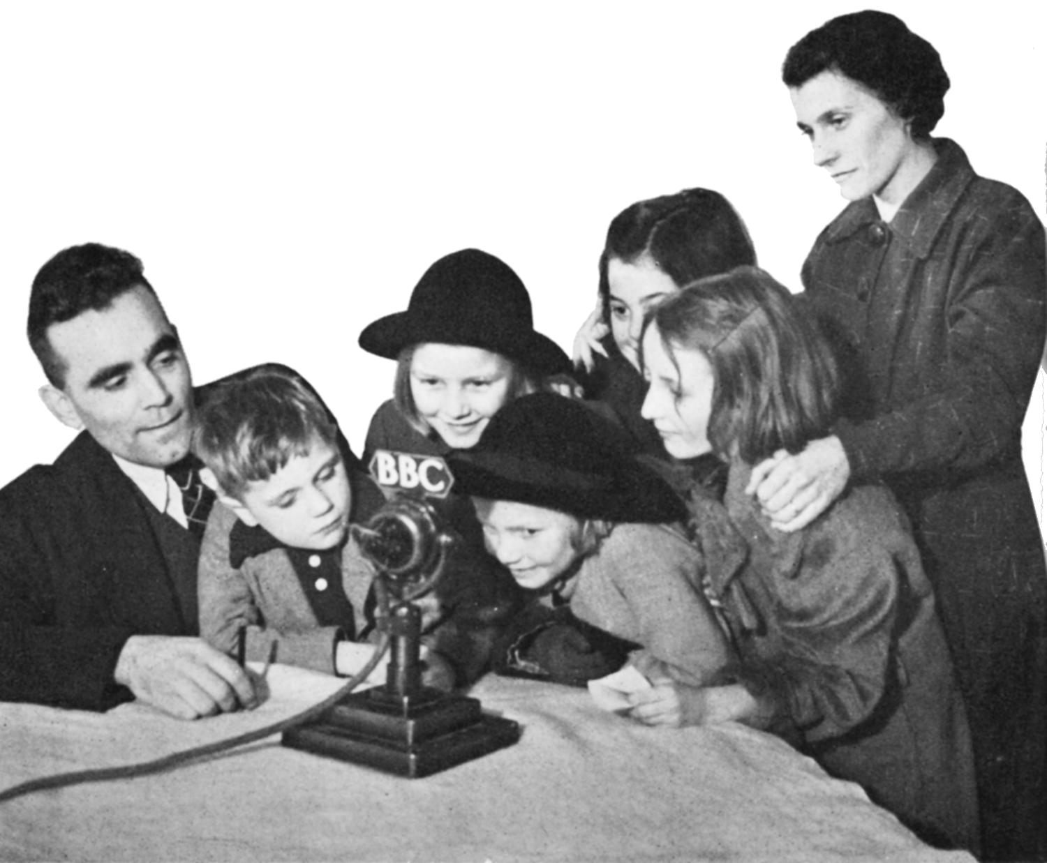 A family around a microphone